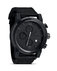 In a chronograph design, Nixon's The Ride watch mixes stainless steel with sleek leather for a look that makes a bold yet laid-back impression. In a chronograph design, Nixon's The Ride watch mixes stainless steel with sleek leather for a look that makes a bold yet laid-back impression.