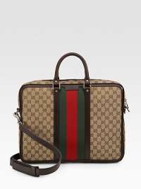 GG fabric briefcase with signature web detail. Double zip top closure with lock Double handles Adjustable, detachable shoulder strap Red/green/red signature web Light gold hardware Interior zip, cell phone and PDA pockets Padded laptop compartment with tab snap 2.4W X 12.2H X 16.5L Made in Italy GG fabric briefcase with signature web detail. Double zip top closure with lock Double handles Adjustable, detachable shoulder strap Red/green/red signature web Light gold hardware Interior zip, cell phone and PDA pockets Padded laptop compartment with tab snap 2.4W X 12.2H X 16.5L Made in Italy