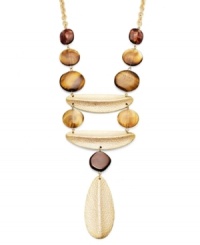 Explore the neutral zone. A earth-tone blend of tiger's eye and chocolate acrylic beads decorate Alfani's intricate Y-shaped necklace. Set in gold tone mixed metal. Approximate length: 24 inches + 3-inch extender. Approximate drop: 6 inches. Explore the neutral zone. A earth-tone blend of tiger's eye and chocolate acrylic beads decorate Alfani's intricate Y-shaped necklace. Set in gold tone mixed metal. Approximate length: 24 inches + 3-inch extender. Approximate drop: 6 inches.