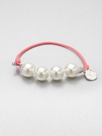 A short strand of four, lustrous pearls on a colorful elastic. Elastic cord10mm round white organic man-made pearlsDiameter, about 3Slip-on styleImported A short strand of four, lustrous pearls on a colorful elastic. Elastic cord10mm round white organic man-made pearlsDiameter, about 3Slip-on styleImported