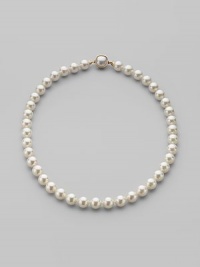 A classic strand of white organic man-made pearls is essential elegance. 10mm white round pearls Length, about 18 18k gold vermeil and mabé pearl push-lock clasp Made in Spain A classic strand of white organic man-made pearls is essential elegance. 10mm white round pearls Length, about 18 18k gold vermeil and mabé pearl push-lock clasp Made in Spain