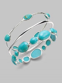 From the Scultura Collection. Subtly hammered sterling silver is dotted with smooth, vibrant stones of turquoise cabochon.Turquoise cabochon Sterling silver Diameter, about 2½ Imported From the Scultura Collection. Subtly hammered sterling silver is dotted with smooth, vibrant stones of turquoise cabochon.Turquoise cabochon Sterling silver Diameter, about 2½ Imported