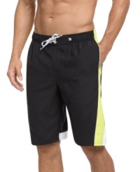 This sporty bathing suit from Nike upgrades your beach style. This sporty bathing suit from Nike upgrades your beach style.