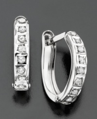 Dress up with a little dazzle. 14k white gold hoop earrings with diamond accents. Approximate diameter: 1/4 inch. Dress up with a little dazzle. 14k white gold hoop earrings with diamond accents. Approximate diameter: 1/4 inch.