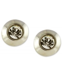Subtle sparkle is all you need. Vince Camuto's stud earrings feature a sleek design with small crystal accents at the center. Crafted in silver tone mixed metal. Approximate diameter: 1/2 inch.