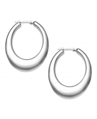 Shapely and stunning. These oval-shaped flat hoop earrings are available in a medium size and crafted in sterling silver for a subtle approach to elegance. Approximate drop: 1-3/8 inches. Approximate drop: 7/8 inch. Shapely and stunning. These oval-shaped flat hoop earrings are available in a medium size and crafted in sterling silver for a subtle approach to elegance. Approximate drop: 1-3/8 inches. Approximate drop: 7/8 inch.