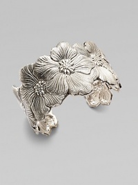 Nature takes center stage with this beautiful design featuring layers of pretty petals. Sterling silverSlip-on styleDiameter, about 2¼Made in Italy Nature takes center stage with this beautiful design featuring layers of pretty petals. Sterling silverSlip-on styleDiameter, about 2¼Made in Italy