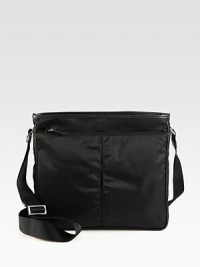 Streamlined design, handsomely crafted in signature tessuto nylon.Zip closureAdjustable shoulder strapExterior, interior zip pocketsNylon13W x 11H x 3DMade in Italy Streamlined design, handsomely crafted in signature tessuto nylon.Zip closureAdjustable shoulder strapExterior, interior zip pocketsNylon13W x 11H x 3DMade in Italy