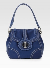 Casual denim look with contrast topstitching, luxe crocodile knob and raw edge finish.Shoulder strap, 8½ drop Turnlock closure One outside snap pocket One inside zip pocket Two inside open pockets Signature jacquard lining 13W X 11H X 6D Made in Italy Casual denim look with contrast topstitching, luxe crocodile knob and raw edge finish.Shoulder strap, 8½ drop Turnlock closure One outside snap pocket One inside zip pocket Two inside open pockets Signature jacquard lining 13W X 11H X 6D Made in Italy