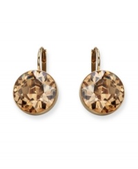 Be a golden girl in these stunners from Swarovski. Earrings feature bold yellow crystals on gold-plated mixed metal. Approximate drop: 1 inch. Be a golden girl in these stunners from Swarovski. Earrings feature bold yellow crystals on gold-plated mixed metal. Approximate drop: 1 inch.