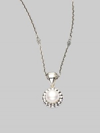 From the Luna Collection. A round pearl pendant with fluted border is suspended on an adjustable chain link.Pearl Sterling silver Length, about 16 - 18 Pendant width, about ½ Pendant length, about 1 Lobster clasp closure Imported 