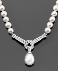 Elegant pearls (9mm) are heightened in beauty with the addition of sparkling round-cut diamonds (1/3 ct. t.w.) in this breathtaking necklace. Approximate length: 17 inches. Approximate drop: 1-1/4 inches. Elegant pearls (9mm) are heightened in beauty with the addition of sparkling round-cut diamonds (1/3 ct. t.w.) in this breathtaking necklace. Approximate length: 17 inches. Approximate drop: 1-1/4 inches.