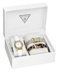 Show your GUESS love with this crystal-embellished timepiece with chic interchangeable leather straps. Show your GUESS love with this crystal-embellished timepiece with chic interchangeable leather straps.