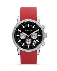 Make a statement with this bold watch from MICHAEL Michael Kors, boasting silver markers and a textured top ring. Sporty yet sleek, this piece ensures you're always ready for action. Make a statement with this bold watch from MICHAEL Michael Kors, boasting silver markers and a textured top ring. Sporty yet sleek, this piece ensures you're always ready for action.