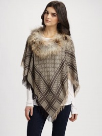 This intricately woven topper is embellished with signature GG pattern, fringed edges and natural fox fur for a chic, stylish touch.50% wool/23% silk/23% viscose/4% polyesterDry cleanMade in ItalyFur origin: Finland This intricately woven topper is embellished with signature GG pattern, fringed edges and natural fox fur for a chic, stylish touch.50% wool/23% silk/23% viscose/4% polyesterDry cleanMade in ItalyFur origin: Finland