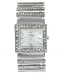 Climb to new style heights with this unique ladder bracelet watch by Style&co. Silver tone mixed metal ladder bracelet with crystal accents and rectangular case. Bezel embellished with crystal accents. Mother-of-pearl dial features silver tone numerals at twelve and six o'clock, stick indices, three hands and logo. Quartz movement. Two-year limited warranty. Climb to new style heights with this unique ladder bracelet watch by Style&co. Silver tone mixed metal ladder bracelet with crystal accents and rectangular case. Bezel embellished with crystal accents. Mother-of-pearl dial features silver tone numerals at twelve and six o'clock, stick indices, three hands and logo. Quartz movement. Two-year limited warranty.