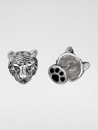 Wild about style, these antiqued sterling silver cuff links are crafted in a tiger's head and paw design.Sterling silverPaw-shaped backAbout .67 diam.Made in USA Wild about style, these antiqued sterling silver cuff links are crafted in a tiger's head and paw design.Sterling silverPaw-shaped backAbout .67 diam.Made in USA