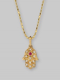 The hamsa, or open hand, a graceful symbol of protection in many cultures, becomes a shimmering necklace, set with diamonds and a single ruby, suspended from a 14k gold ball chain. Diamonds, 0.05 tcw Ruby, 0.02 ct 14k yellow gold Chain length, about 16 Pendant, about ½L x ¼W Lobster clasp Imported