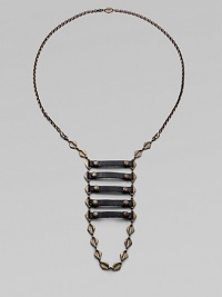 From the Signature Collection. A modern, urban design with an ancient, tribal look, combining hand-stained, antiqued brass links with coated Italian leather.BrassLeatherLength, about 23Double front lobster claspsMade in USA From the Signature Collection. A modern, urban design with an ancient, tribal look, combining hand-stained, antiqued brass links with coated Italian leather.BrassLeatherLength, about 23Double front lobster claspsMade in USA
