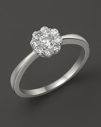 Faceted diamonds in 14K white gold flower setting. Faceted diamonds in 14K white gold flower setting.
