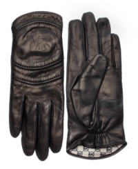 MK marks the spot. These classic gloves by MICHAEL Michael Kors are crafted from supple, logo-embossed lambskin leather. MK marks the spot. These classic gloves by MICHAEL Michael Kors are crafted from supple, logo-embossed lambskin leather.