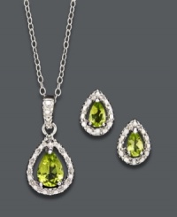 Add a healthy glow to your look. Pear-cut peridots (1-1/5 ct. t.w.) shine amidst sparkling diamond accents in Victoria Townsend's spectacular pendant and earring set. Crafted in sterling silver. Approximate length: 18 inches. Approximate pendant drop: 11/16 inch. Approximate earring drop: 5/16 inch. Add a healthy glow to your look. Pear-cut peridots (1-1/5 ct. t.w.) shine amidst sparkling diamond accents in Victoria Townsend's spectacular pendant and earring set. Crafted in sterling silver. Approximate length: 18 inches. Approximate pendant drop: 11/16 inch. Approximate earring drop: 5/16 inch.