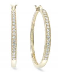 Up your glam factor. YellOra™'s trendy hoop earrings showcase round-cut diamonds front and center (1/2 ct. t.w.). Precious metal made from a combination of pure gold, sterling silver and palladium. Approximate diameter: 1-1/10 inches. Up your glam factor. YellOra™'s trendy hoop earrings showcase round-cut diamonds front and center (1/2 ct. t.w.). Precious metal made from a combination of pure gold, sterling silver and palladium. Approximate diameter: 1-1/10 inches.