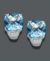 Add a special touch with an extra splash of color. These head-turning studs feature cushion-cut blue topaz (1/4 ct. t.w.) topped off with sparkling diamond accents. Earrings set in sterling silver. Approximate diameter: 3/4 inch. Add a special touch with an extra splash of color. These head-turning studs feature cushion-cut blue topaz (1/4 ct. t.w.) topped off with sparkling diamond accents. Earrings set in sterling silver. Approximate diameter: 3/4 inch.