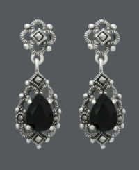 Let old world glamour inspire you. Genevieve & Grace earrings feature pear-cut onyx stones (5 mm x 7 mm) encircled by glittering marcasite in sterling silver. Approximate drop: 1 inch. Let old world glamour inspire you. Genevieve & Grace earrings feature pear-cut onyx stones (5 mm x 7 mm) encircled by glittering marcasite in sterling silver. Approximate drop: 1 inch.