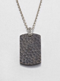 From the Palu Collection. The hand-hammered design motif of the Palu collection distinguishes a blackened bronze dog tag pendant, connected by a sterling silver bale to a bold chain of bright stainless steel.Bronze and sterling silverStainless steelChain length, about 24Pendant, about 2L X 1WLobster claspMade in Bali From the Palu Collection. The hand-hammered design motif of the Palu collection distinguishes a blackened bronze dog tag pendant, connected by a sterling silver bale to a bold chain of bright stainless steel.Bronze and sterling silverStainless steelChain length, about 24Pendant, about 2L X 1WLobster claspMade in Bali