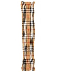A super lightweight scarf that's astonishingly soft in a blend of Italian silk and linen, featuring Burberry's iconic check pattern for an exciting accent. A super lightweight scarf that's astonishingly soft in a blend of Italian silk and linen, featuring Burberry's iconic check pattern for an exciting accent.