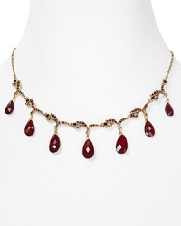 Richly colored glass stones punctuate a delicate Carolee necklace, crafted from 14-karat gold plate. Richly colored glass stones punctuate a delicate Carolee necklace, crafted from 14-karat gold plate.