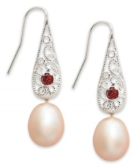 Perfection in peach. Sterling-silver drop earrings exude style with peach-colored cultured freshwater pearls (8-9 mm) and round-cut garnets (1/6 ct. t.w.). Approximate drop: 1-1/2 inches. Perfection in peach. Sterling-silver drop earrings exude style with peach-colored cultured freshwater pearls (8-9 mm) and round-cut garnets (1/6 ct. t.w.). Approximate drop: 1-1/2 inches.