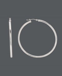 Style that's simple, but still makes a cool statement. Earrings feature a traditional hoop design and click backing set in polished, 14k white gold. Approximate diameter: 2 inches. Style that's simple, but still makes a cool statement. Earrings feature a traditional hoop design and click backing set in polished, 14k white gold. Approximate diameter: 2 inches.
