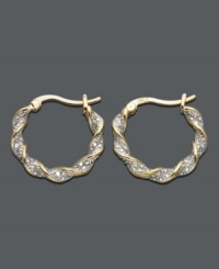 Simple hoops with a sparkling twist. Earrings by Victoria Townsend are crafted in 18k gold over sterling silver with round-cut diamond accents and a unique twisted design. Approximate diameter: 3/4 inch. Simple hoops with a sparkling twist. Earrings by Victoria Townsend are crafted in 18k gold over sterling silver with round-cut diamond accents and a unique twisted design. Approximate diameter: 3/4 inch.