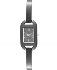 Delicate details add an air of elegance to this Nine West watch. Crafted of gunmetal tone mixed metal strap and rectangular case. Gray dial features silver tone dot markers, numerals at six and twelve o'clock, silver tone hour and minute hands, sweeping second hand and logo at six o'clock. Quartz movement. Limited lifetime warranty. Delicate details add an air of elegance to this Nine West watch. Crafted of gunmetal tone mixed metal strap and rectangular case. Gray dial features silver tone dot markers, numerals at six and twelve o'clock, silver tone hour and minute hands, sweeping second hand and logo at six o'clock. Quartz movement. Limited lifetime warranty.