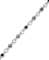 Stunning in sapphire. Victoria Townsend's standout tennis bracelet features round-cut sapphires (5 ct. t.w.) and sparkling diamond accents. Crafted in sterling silver. Approximate length: 7 inches. Stunning in sapphire. Victoria Townsend's standout tennis bracelet features round-cut sapphires (5 ct. t.w.) and sparkling diamond accents. Crafted in sterling silver. Approximate length: 7 inches.