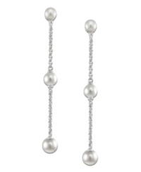 Elongated grace. Cultured freshwater pearls (4-8 mm) are arranged across a sterling silver chain to create a sophisticated set of long drop earrings. Approximate drop: 2 inches. Elongated grace. Cultured freshwater pearls (4-8 mm) are arranged across a sterling silver chain to create a sophisticated set of long drop earrings. Approximate drop: 2 inches.