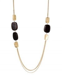Add a long layer of rich, golden tones and rustic hues to your neckline in Kenneth Cole New York necklace. With brown beads and hammered gold tone discs at the double chain. Crafted in gold tone mixed metal. Approximate length: 28 inches + 3-inch extender. Approximate drop: 1 inch. Add a long layer of rich, golden tones and rustic hues to your neckline in Kenneth Cole New York necklace. With brown beads and hammered gold tone discs at the double chain. Crafted in gold tone mixed metal. Approximate length: 28 inches + 3-inch extender. Approximate drop: 1 inch.