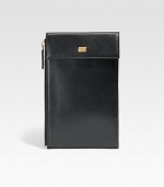 A stylish travel companion with all of the necessary compartments to store your boarding pass, passport, credit cards, money and other important documents, crafted in soft Italian calfskin leather.Zip, snap button closureWrist strapOne bill compartmentSix card slots6W x 8HLeatherMade in Italy