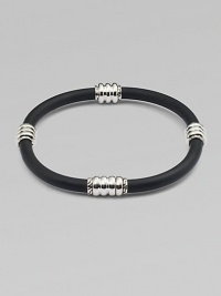 Modern simplicity in a single rubber cord with sterling silver stations.RubberSilverAbout 3 diameterSlip-on styleImported Modern simplicity in a single rubber cord with sterling silver stations.RubberSilverAbout 3 diameterSlip-on styleImported