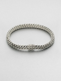 Sterling silver medium oval chain bracelet. Sterling silverSpring claspAbout 3 diam.Imported Sterling silver medium oval chain bracelet. Sterling silverSpring claspAbout 3 diam.Imported