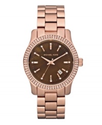 Look on the bright side with this trendy watch by Michael Kors. Look on the bright side with this trendy watch by Michael Kors.