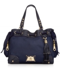 If you dream in couture, this iconic design from Juicy Couture will make every day sweeter. Durable nylon is dressed in gleaming signature hardware with flirty tassels and discrete stud accents, while pockets inside and out organize your it girl essentials. If you dream in couture, this iconic design from Juicy Couture will make every day sweeter. Durable nylon is dressed in gleaming signature hardware with flirty tassels and discrete stud accents, while pockets inside and out organize your it girl essentials.