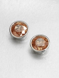 A simply chic style with a richly colored, faceted stone. Cubic zirconiaBrassSize, about .5Post backImported A simply chic style with a richly colored, faceted stone. Cubic zirconiaBrassSize, about .5Post backImported