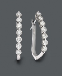 Turn heads with these tantalizing hoop earrings. Crafted in 14k white gold, earrings feature seven certified near colorless diamonds (1 ct. t.w.) in a neat row. Approximate diameter: 3/4 inch. Turn heads with these tantalizing hoop earrings. Crafted in 14k white gold, earrings feature seven certified near colorless diamonds (1 ct. t.w.) in a neat row. Approximate diameter: 3/4 inch.