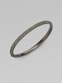 EXCLUSIVELY AT SAKS. Double rows of radiant crystals with a subtle dark cast are hand-set within an antiqued hinged bangle. Crystal Antiqued silvertone Diameter, about 2¼ Push-lock clasp Imported EXCLUSIVELY AT SAKS. Double rows of radiant crystals with a subtle dark cast are hand-set within an antiqued hinged bangle. Crystal Antiqued silvertone Diameter, about 2¼ Push-lock clasp Imported