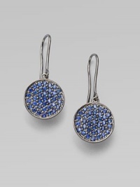 Discs of 14k white gold boast rich clusters of sparkling, vibrant blue sapphires.Sapphire 14k white gold Diameter, about ½ Ear wire Made in USA Discs of 14k white gold boast rich clusters of sparkling, vibrant blue sapphires.Sapphire 14k white gold Diameter, about ½ Ear wire Made in USA