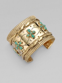 Rich turquoise stones in a floral pattern embellish this highly-detailed style. TurquoiseGoldtone brassDiameter, about 2.24Slip-on styleImported Rich turquoise stones in a floral pattern embellish this highly-detailed style. TurquoiseGoldtone brassDiameter, about 2.24Slip-on styleImported