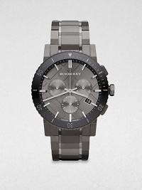 A technical timepiece in brushed and polished grey ion-plated stainless steel. Quartz movementWater resistant to 5 ATMRound grey ion-plated stainless steel case, 42mm (1.7)Decorative black ceramic bezelCheck stamped, gunmetal-finished chronograph dialBar hour markersDate display at 4 o'clockSecond hand Grey ion-plated stainless steel link braceletMade in Switzerland A technical timepiece in brushed and polished grey ion-plated stainless steel. Quartz movementWater resistant to 5 ATMRound grey ion-plated stainless steel case, 42mm (1.7)Decorative black ceramic bezelCheck stamped, gunmetal-finished chronograph dialBar hour markersDate display at 4 o'clockSecond hand Grey ion-plated stainless steel link braceletMade in Switzerland